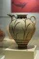 Pottery jug floral motif 16th c BC, NAMA 102926.jpg